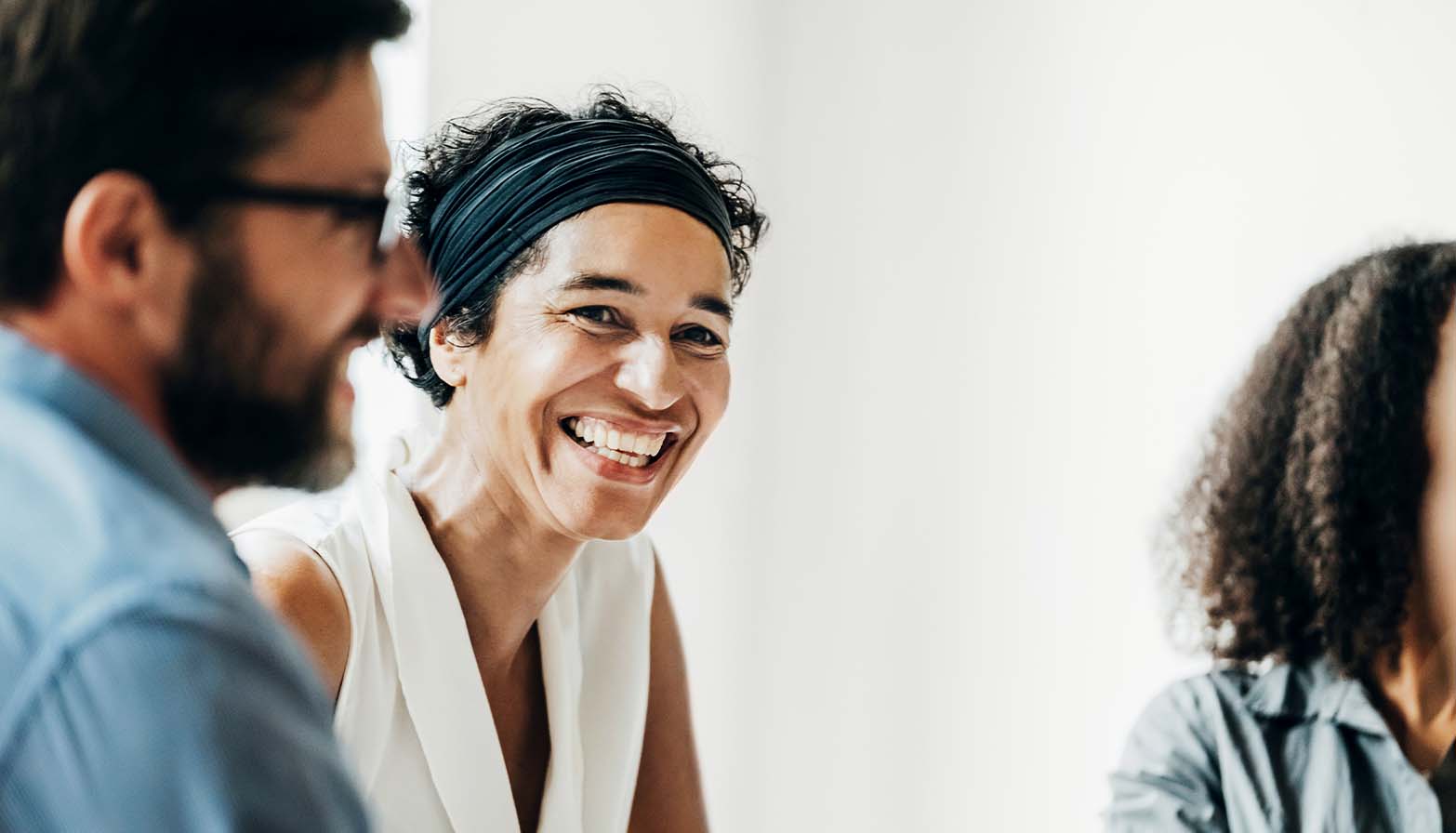 woman smiling in meeting 2
