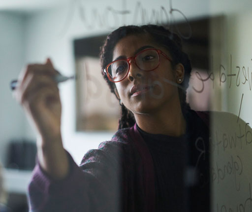 content woman writing on window