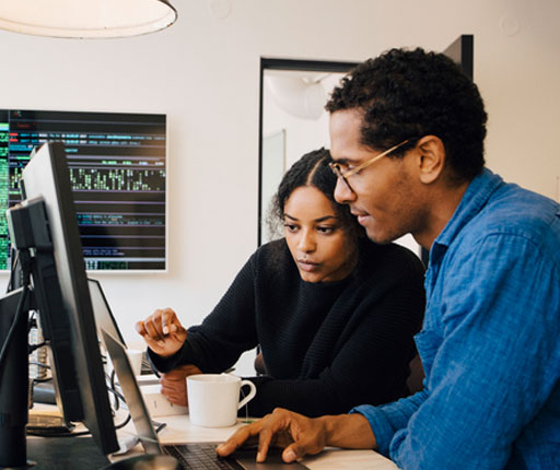 tech coworkers on computers